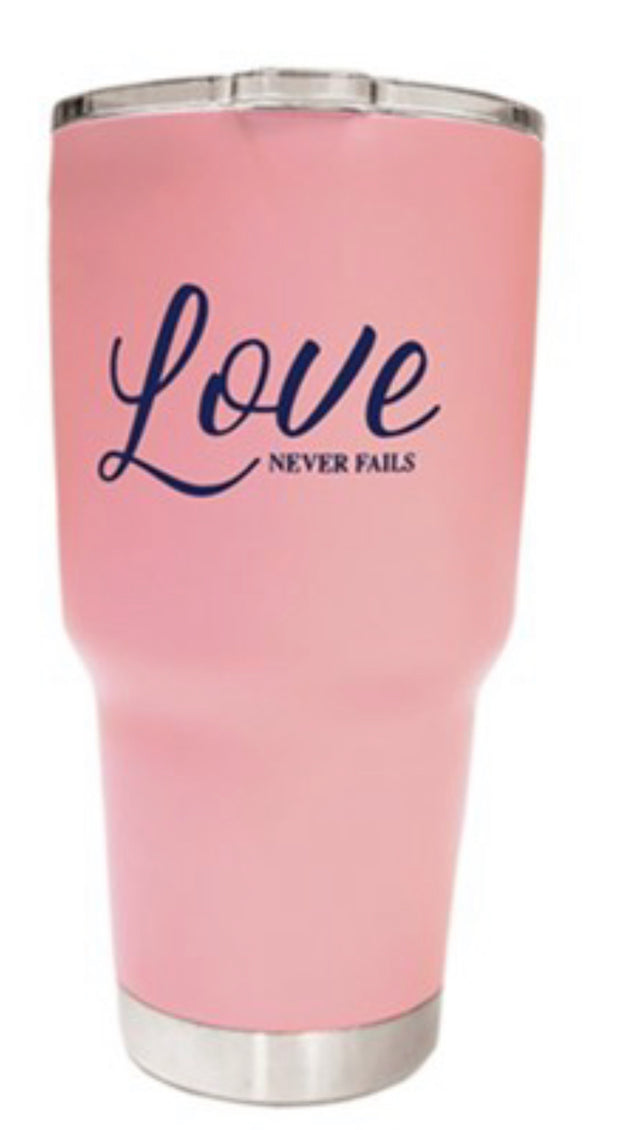 Love Never Fails Travel Mug